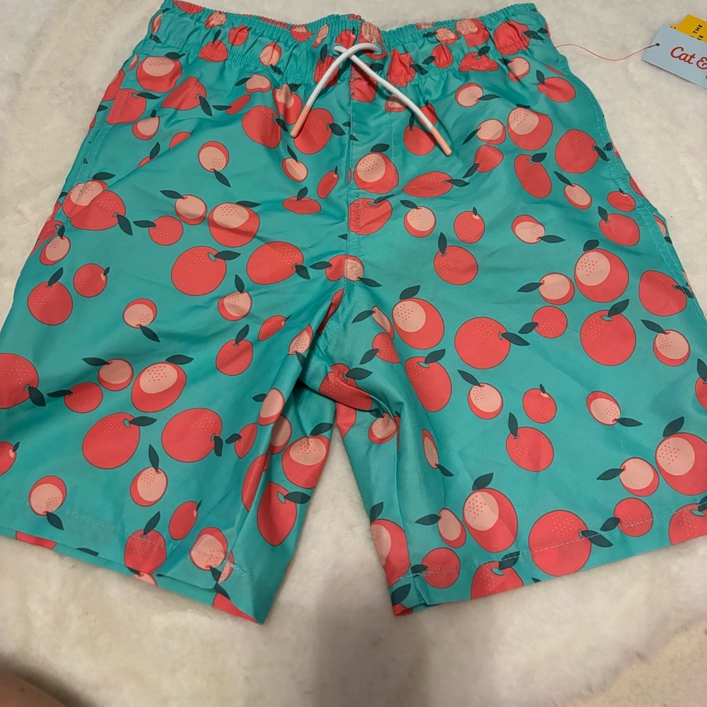 NWT. Cat and jack swim trunks. Size large 12/14